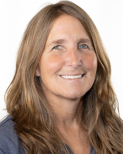 Portrait of Pamela Kocher Brown smiling