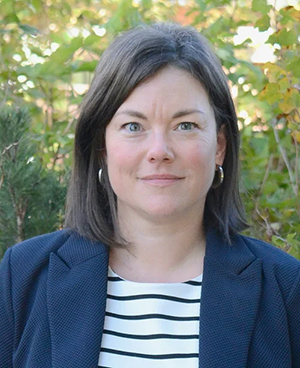 Portrait of Assistant Professor Deborah Silvis with tree in background