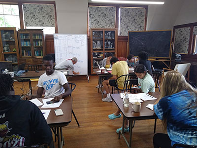 Students in a classroom at Raquette Lake