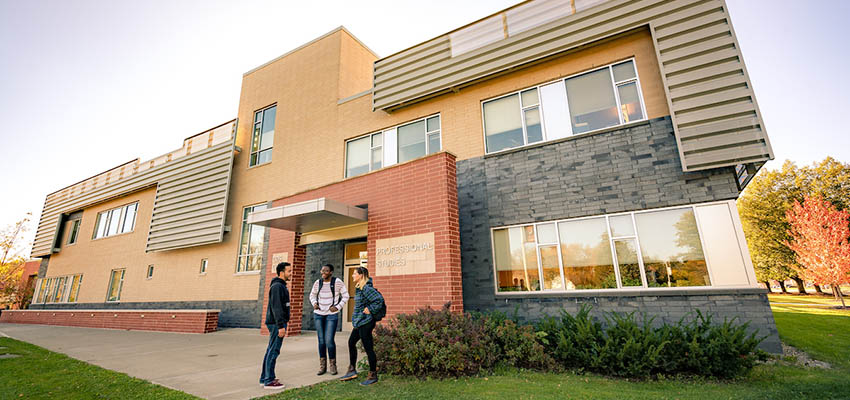 Students outside of the Professional Studies building