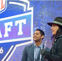 Sport Management masters student in front of an NFL draft backdrop