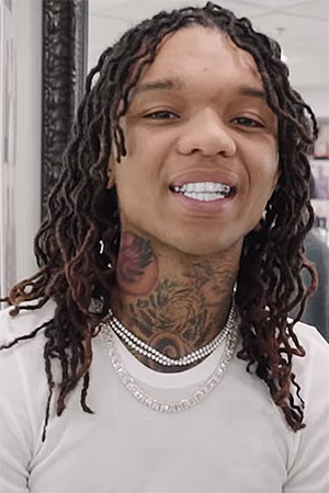 Headshot of rapper Swae Lee smiling