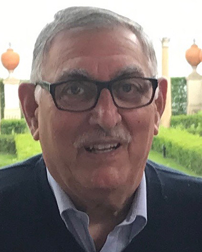 Portrait of Lou Chistolini smiling