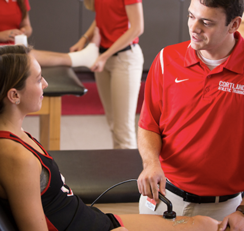 Athletic training student in lab setting
