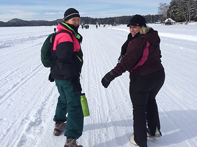 Kim Wieczorek, left, with Renee Potter during a winter trip to Cortland's outdoor campus in Raquette Lake