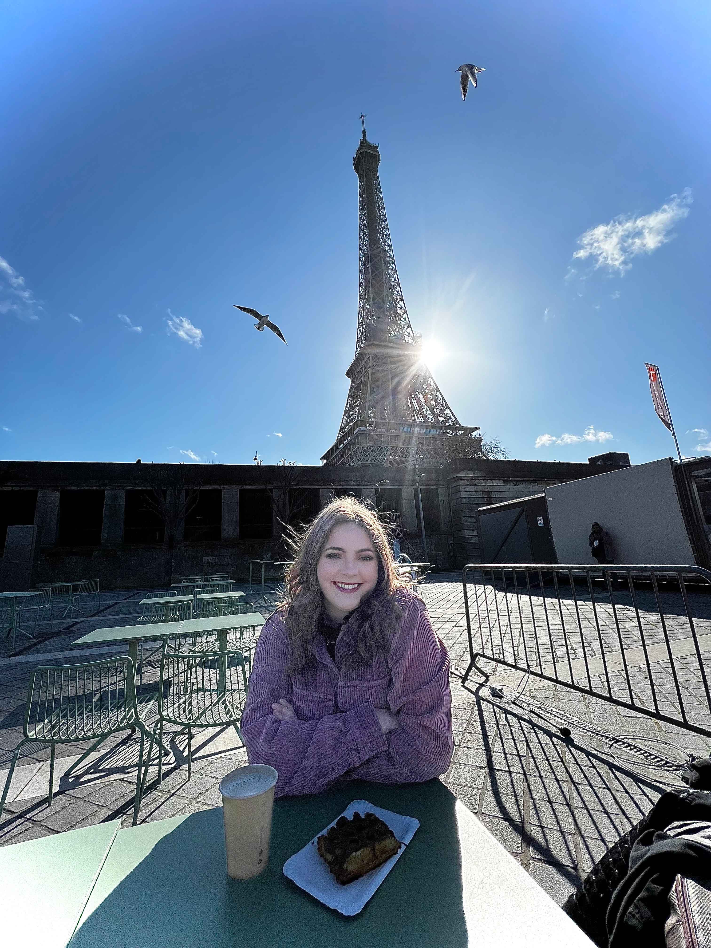 Student pictured with Eiffel Tower in the background