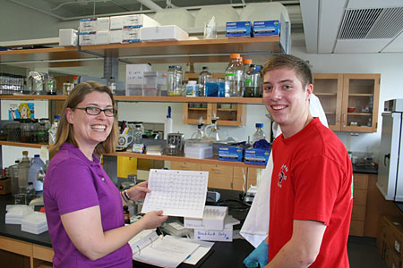 Dr. Chatfield with Casey Peterson in her lab.
