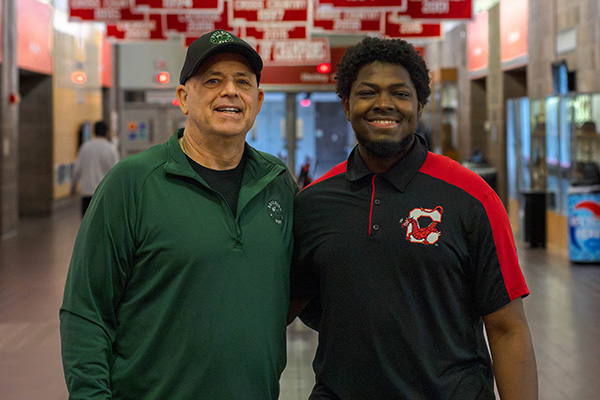 Posed photo of Joe Horan &rsquo;88, M &rsquo;98 pictured at left with Makhatub Hassan at right