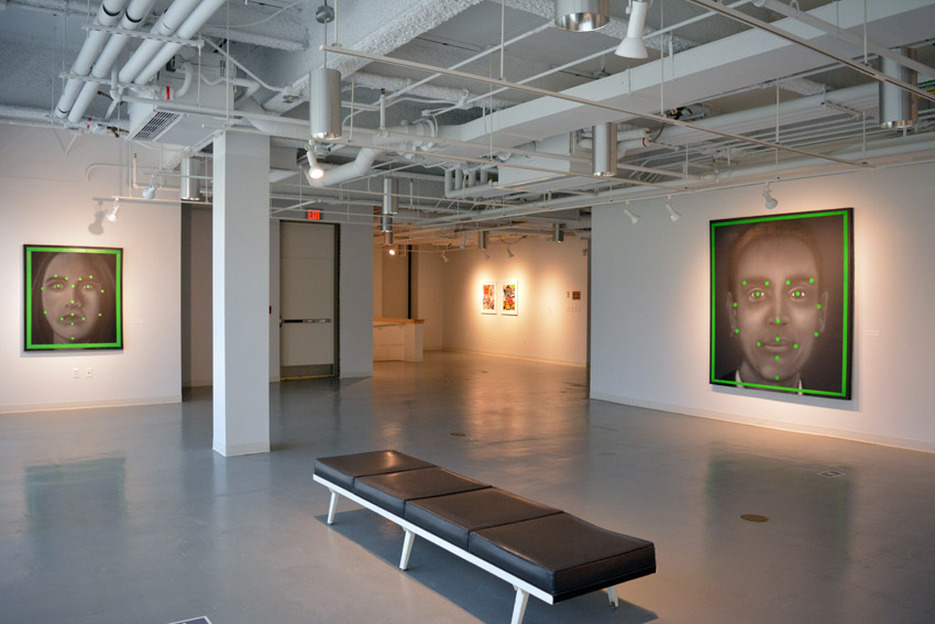 A view into the central gallery featuring works by the BFA candidates Stephen Buscemi and Samantha Reali.
