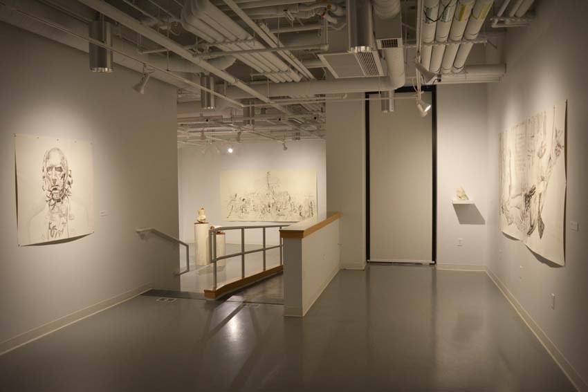 A view into the west gallery featuring Andrew Ellis Johnson's works on paper and cultured marble sculptures as part of the 'Founder' exhibition.