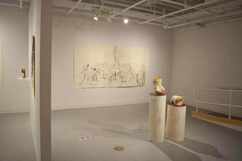 A view into the west gallery featuring Andrew Ellis Johnson's works on paper and one cast iron object and two cultured marble sculptures as part of the 'Founder' exhibition.
