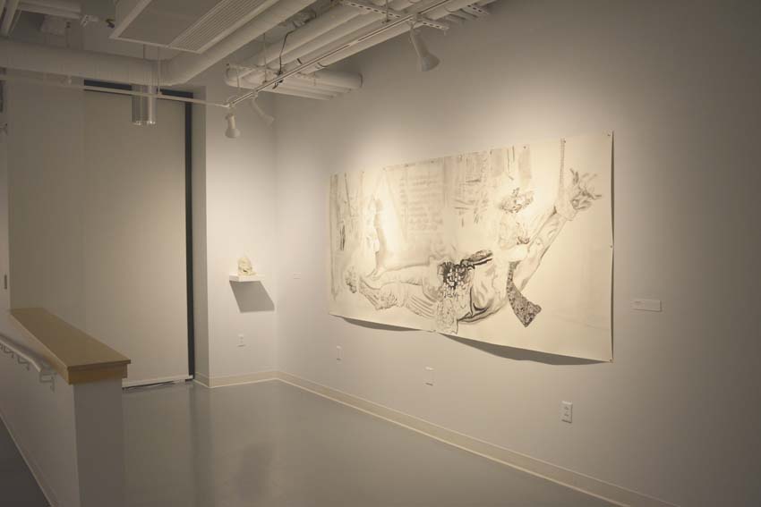 A view into the central gallery featuring Andrew Ellis Johnson's cultured marble sculpture and black and white drawing on paper as part of the 'Founder' exhibition.