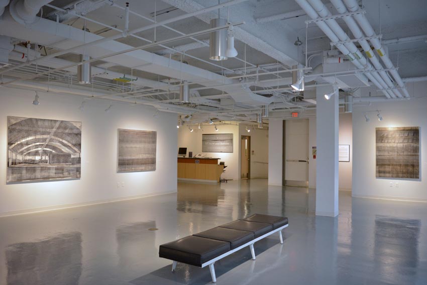 View into the central interior at Dowd Gallery featuring paintings by Binghamton-based artist Natalija Mijatović.