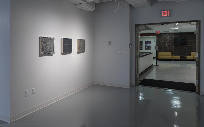 View into the central interior and hallway at Dowd Gallery featuring paintings by Binghamton-based artist Natalija Mijatović. Image: Marcus Newton. 