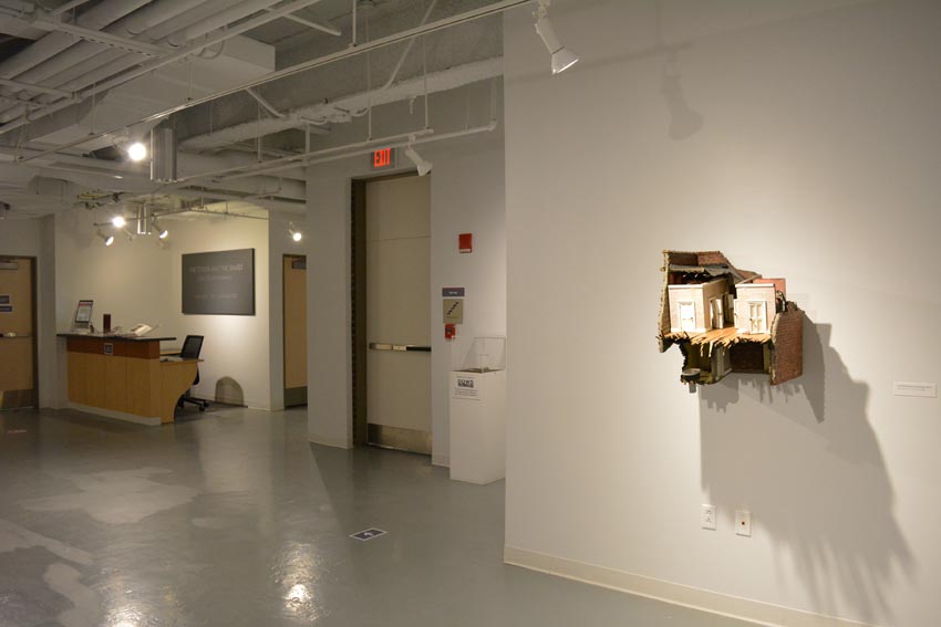 View into the central gallery at Dowd Gallery featuring sculptural objects produced by Buffalo-based sculptor Gary Sczerbaniewicz.   