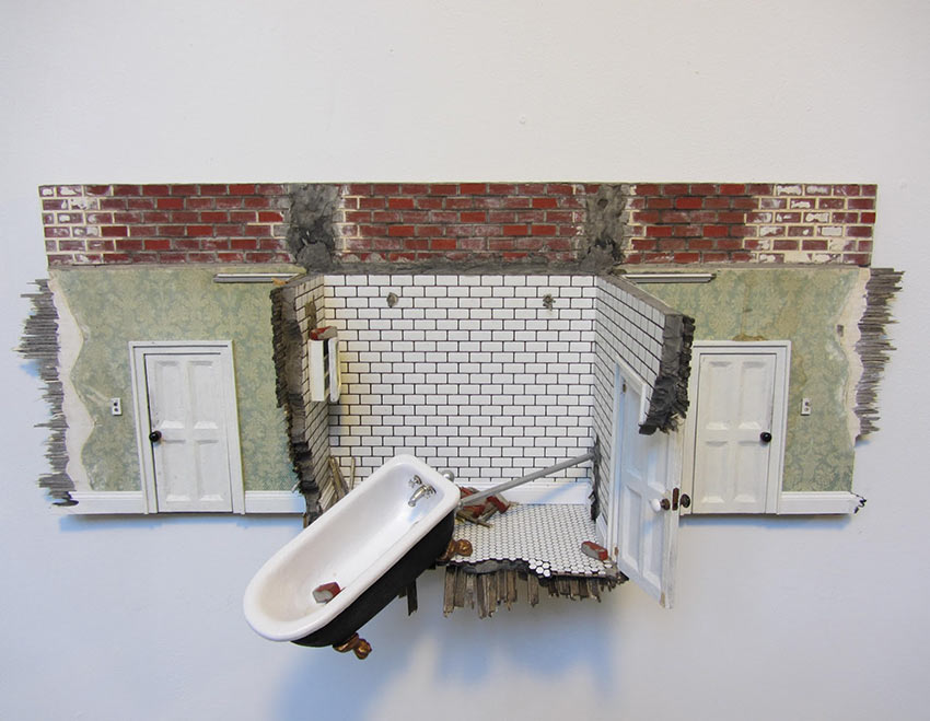 A 3D art piece showing the tear-away of a building, with a free-standing tub hanging from an attached pipe.