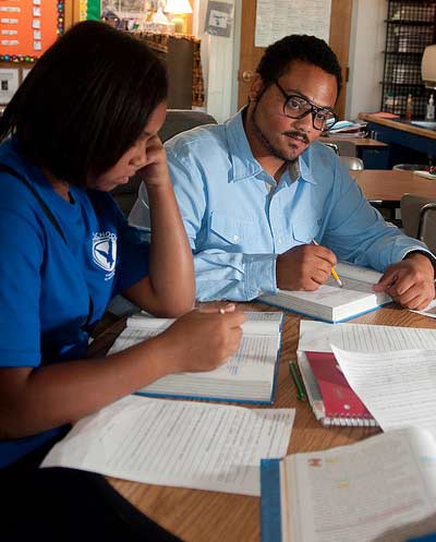 Two students work together on homework.