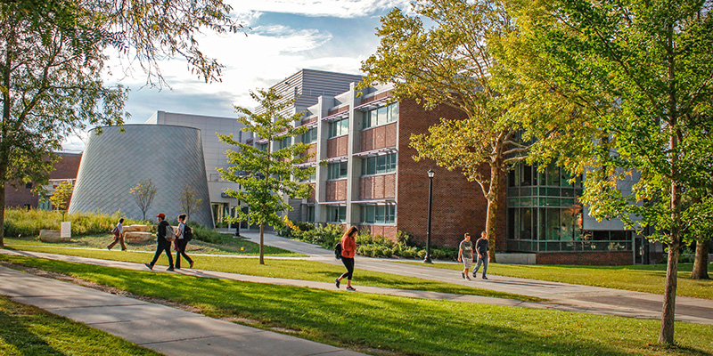 students walking outside Bowers Hall