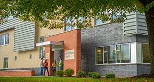 Students in front of the Professional Studies Building