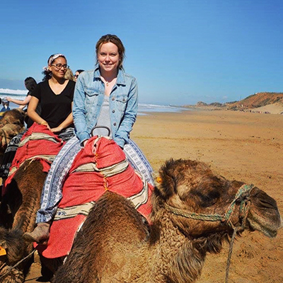 Fulbright winner Christina Garcia ’20 rides on a camel in Spain 