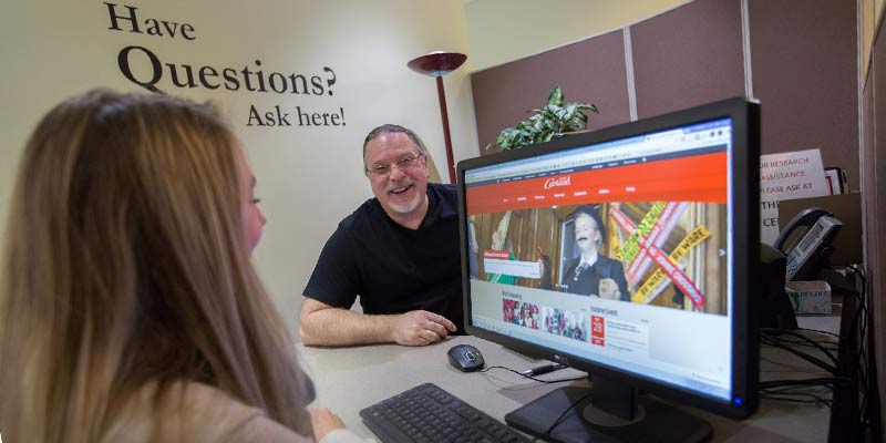 Student getting help in the library