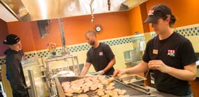 Students working in dining hall