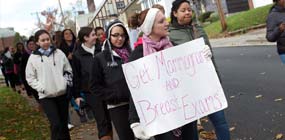 Group of people camapigning for breast cancer awareness